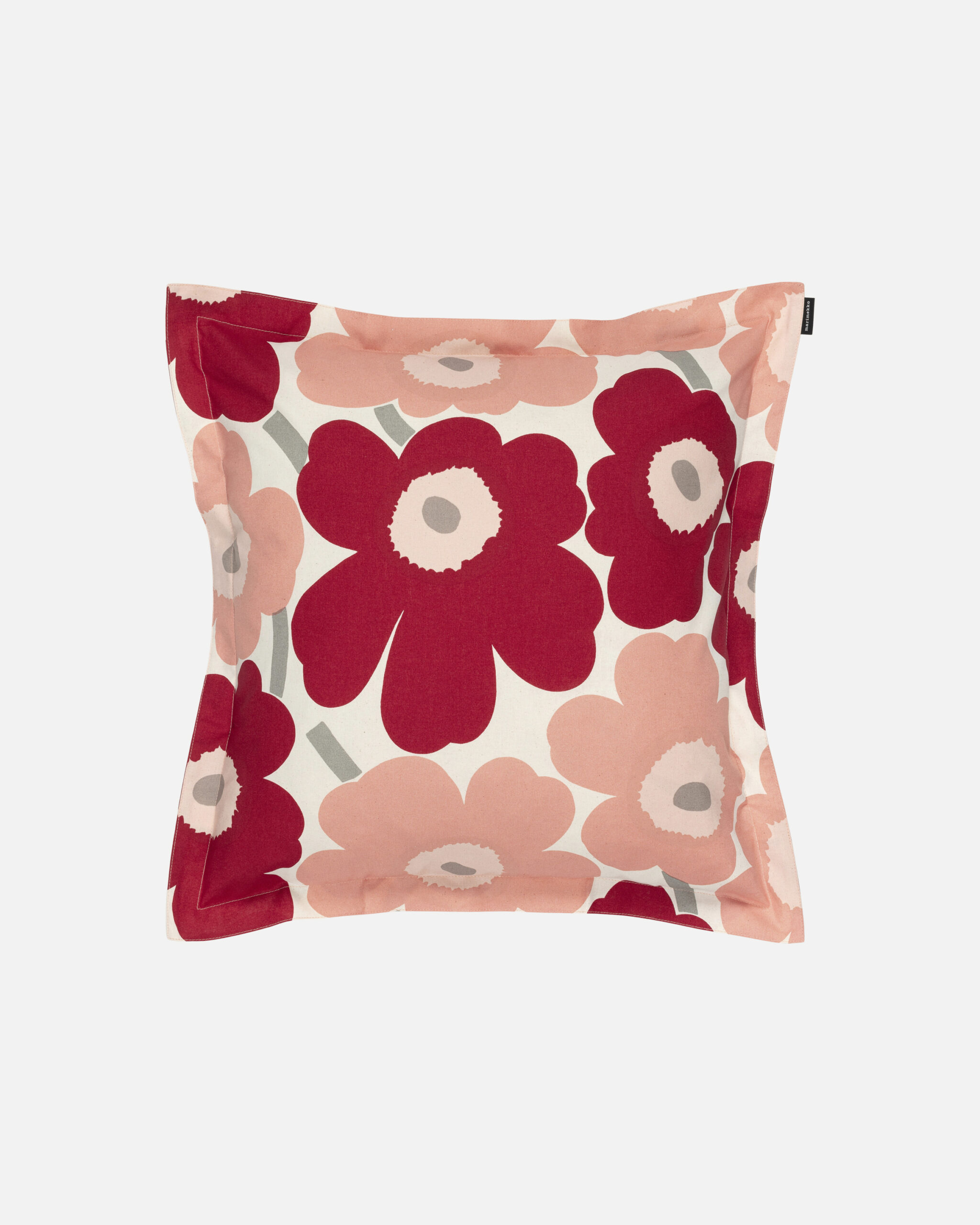 Dieser Kissenüberzug in der Grösse von 50 x 50 cm ist aus Baumwolle und ist mit dem Pieni Unikko Muster gedruckt.